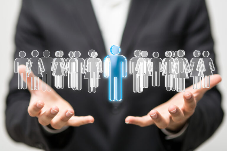 personal  Businessman holding 3D rendering group of blue people